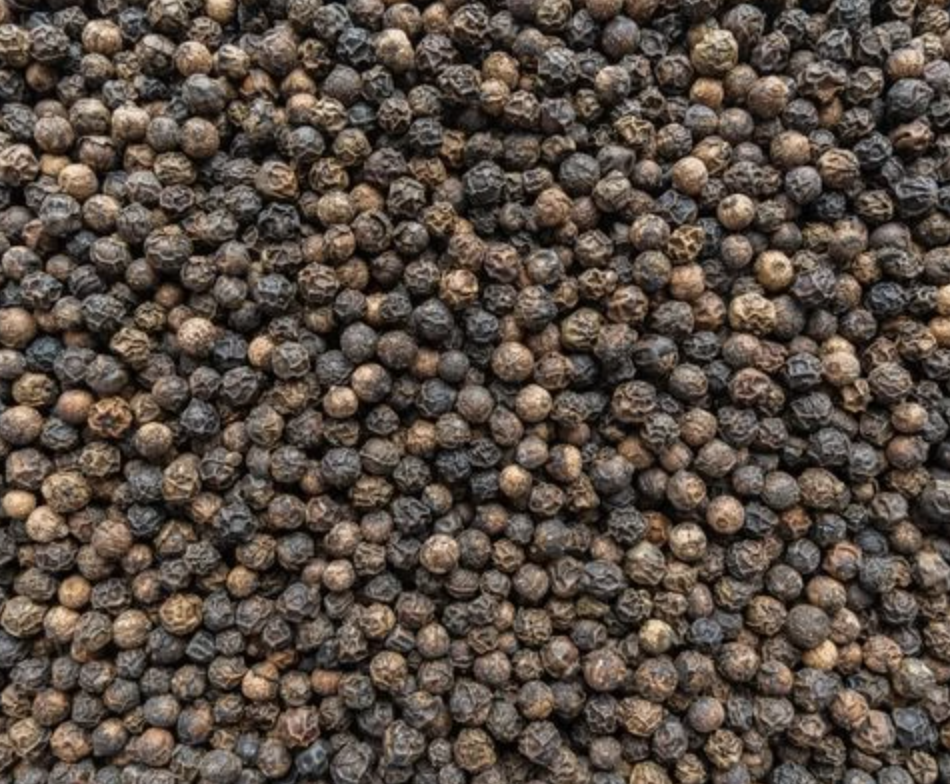 Whole black peppercorns.