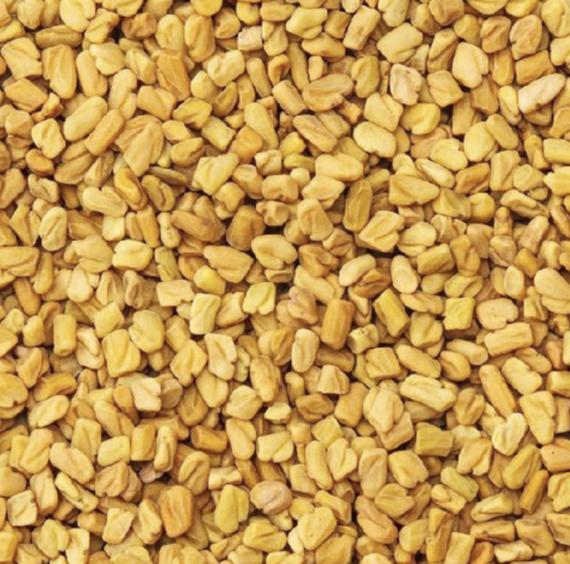 Fenugreek seeds in a small bowl.